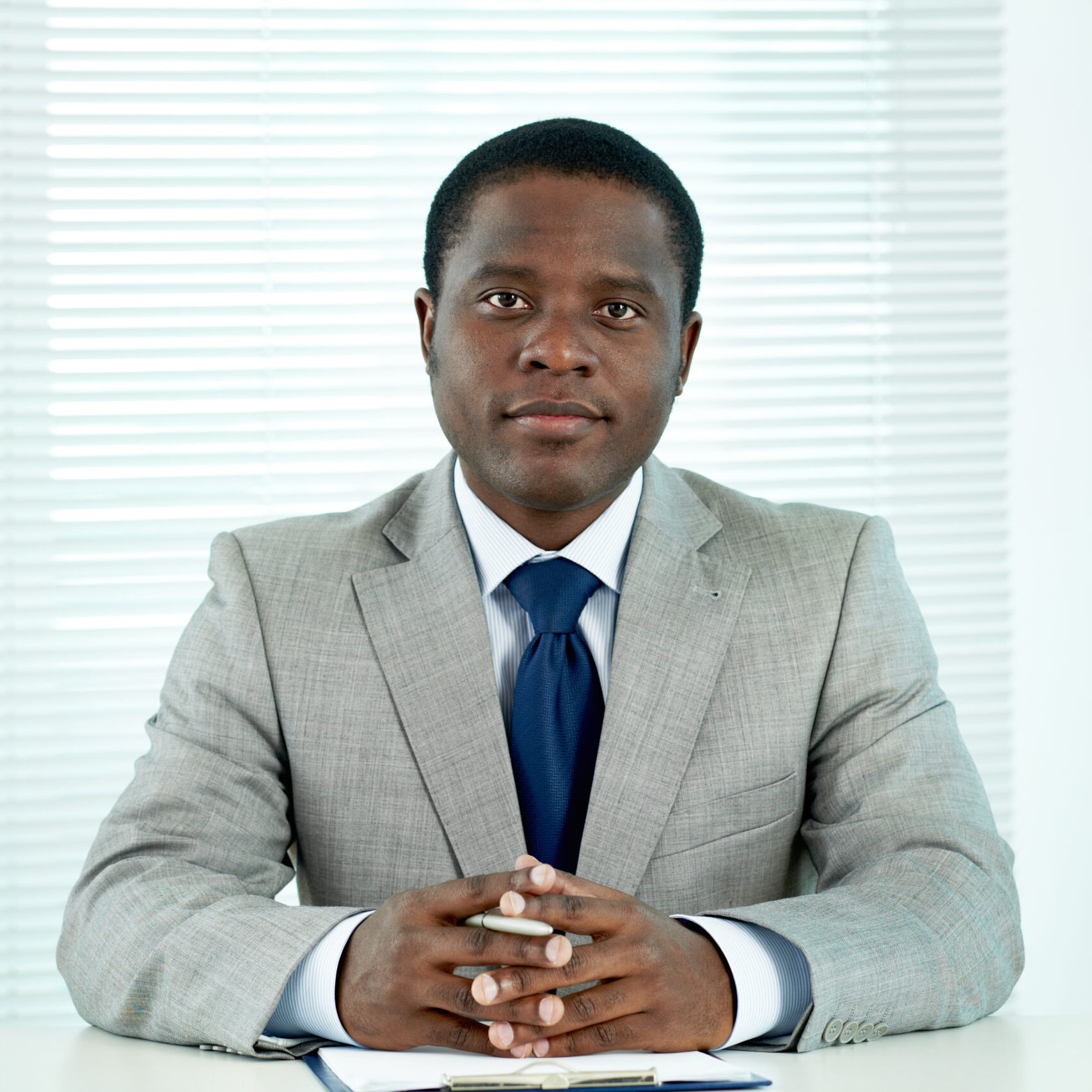 Serious Executive Sitting His Office Scaled E1786641788516